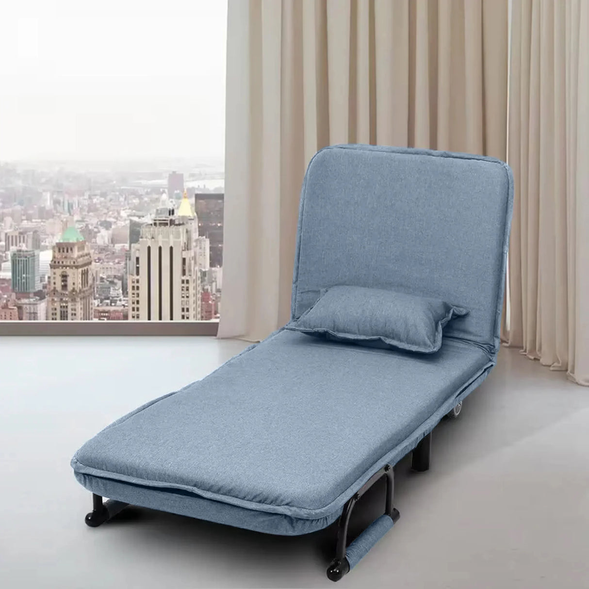 Modern blue folding sofa bed with pillow in bright apartment, HOCC home decor UAE