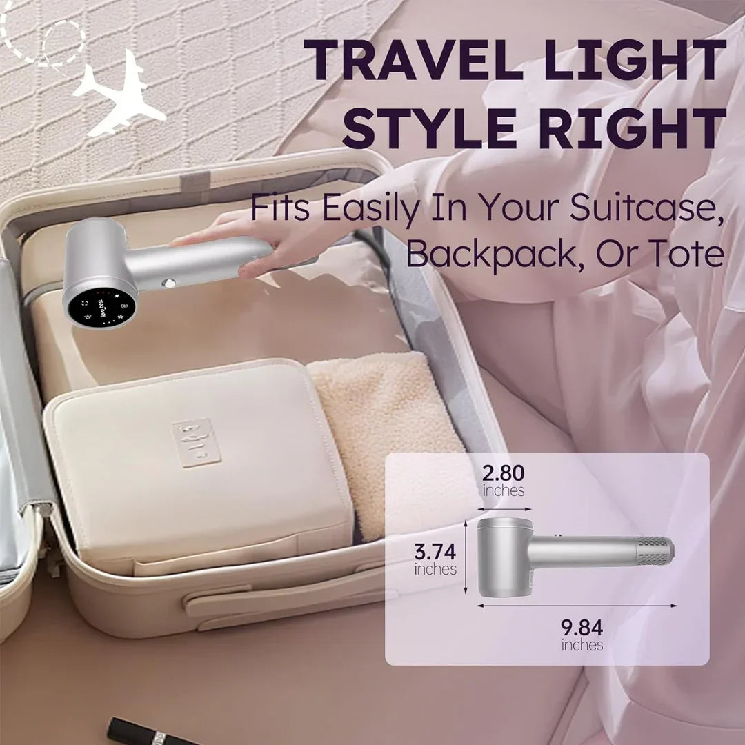 Compact silver hair dryer with digital display placed in a beige suitcase, showing travel-friendly dimensions, HOCC UAE.