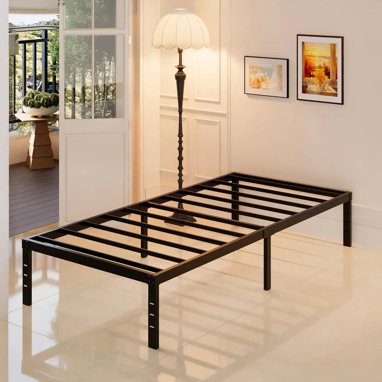 Black metal bed frame in a modern room with floor lamp and wall art, HOCC home decor UAE