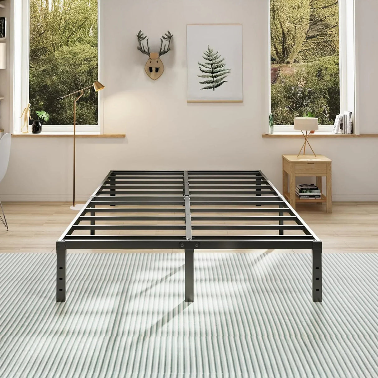 Modern metal bed frame on striped rug in bright bedroom, HOCC home decor UAE