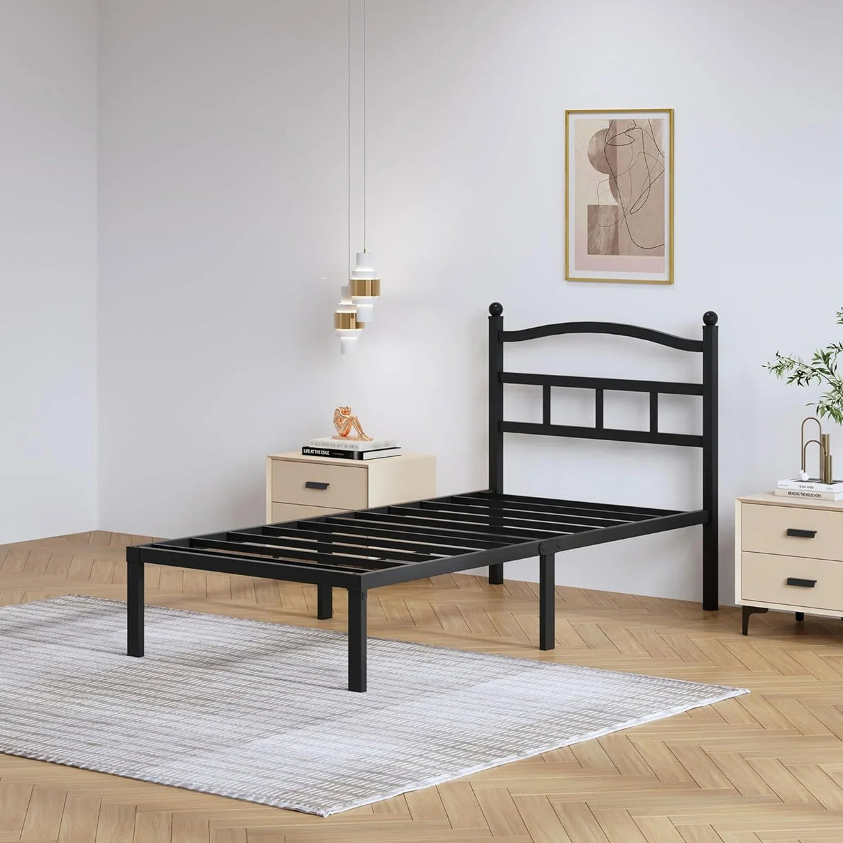 Modern black metal bed frame in a minimalist bedroom with wood floor, bedside tables, and wall art from HOCC online shopping UAE.