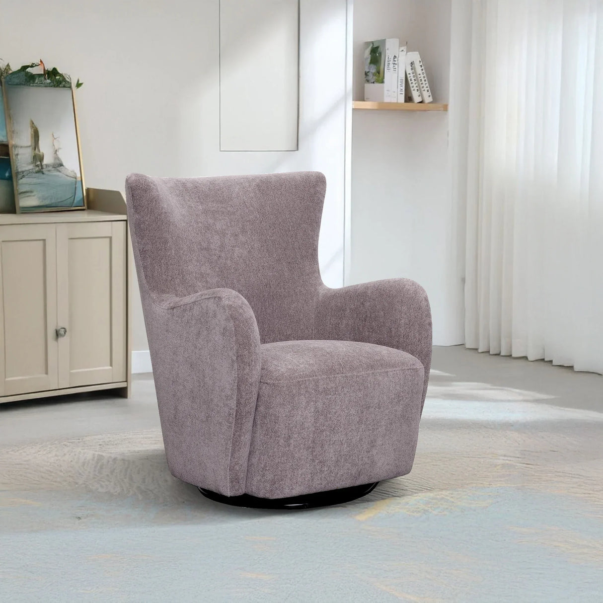 Modern grey swivel armchair in a bright living room with light curtains and cabinet