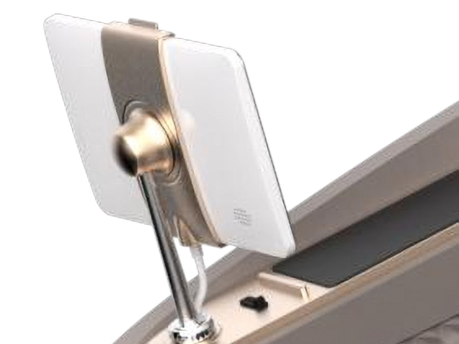 Touch screen remote on its stand beside the armrest