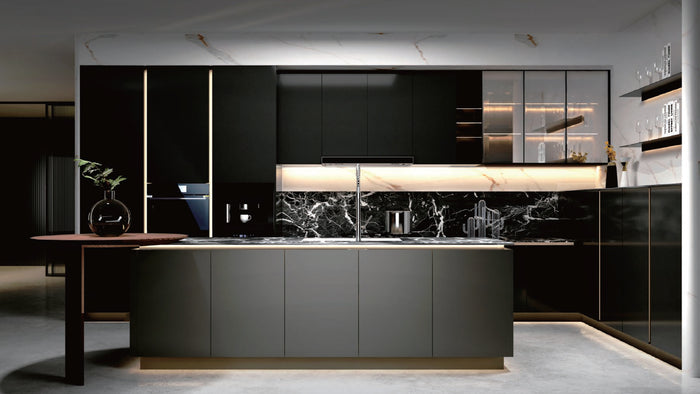 Modern black kitchen cabinets with marble backsplash and under-cabinet lighting