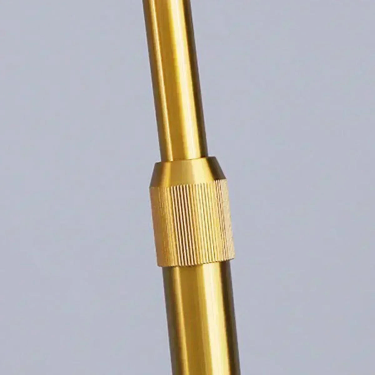 Buy Affordable Sleek Fusion Arched Metal and Marble Floor Lamp with Integrated Side Table in Dubai - UAE | Cheap Price