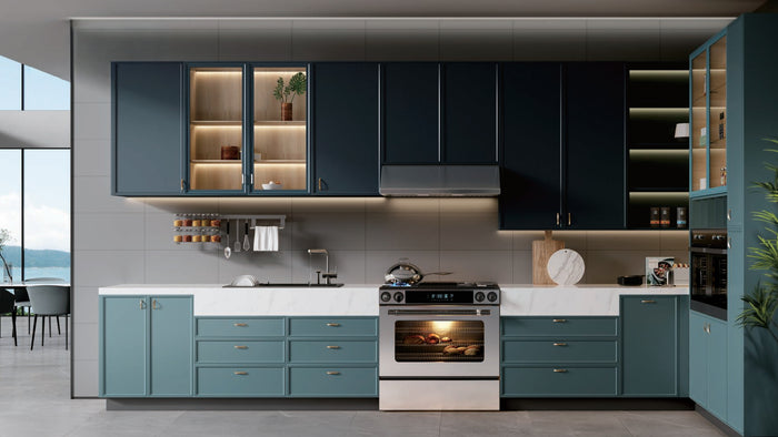 Modern kitchen with blue cabinets, built-in appliances, marble countertop, and under-cabinet lighting