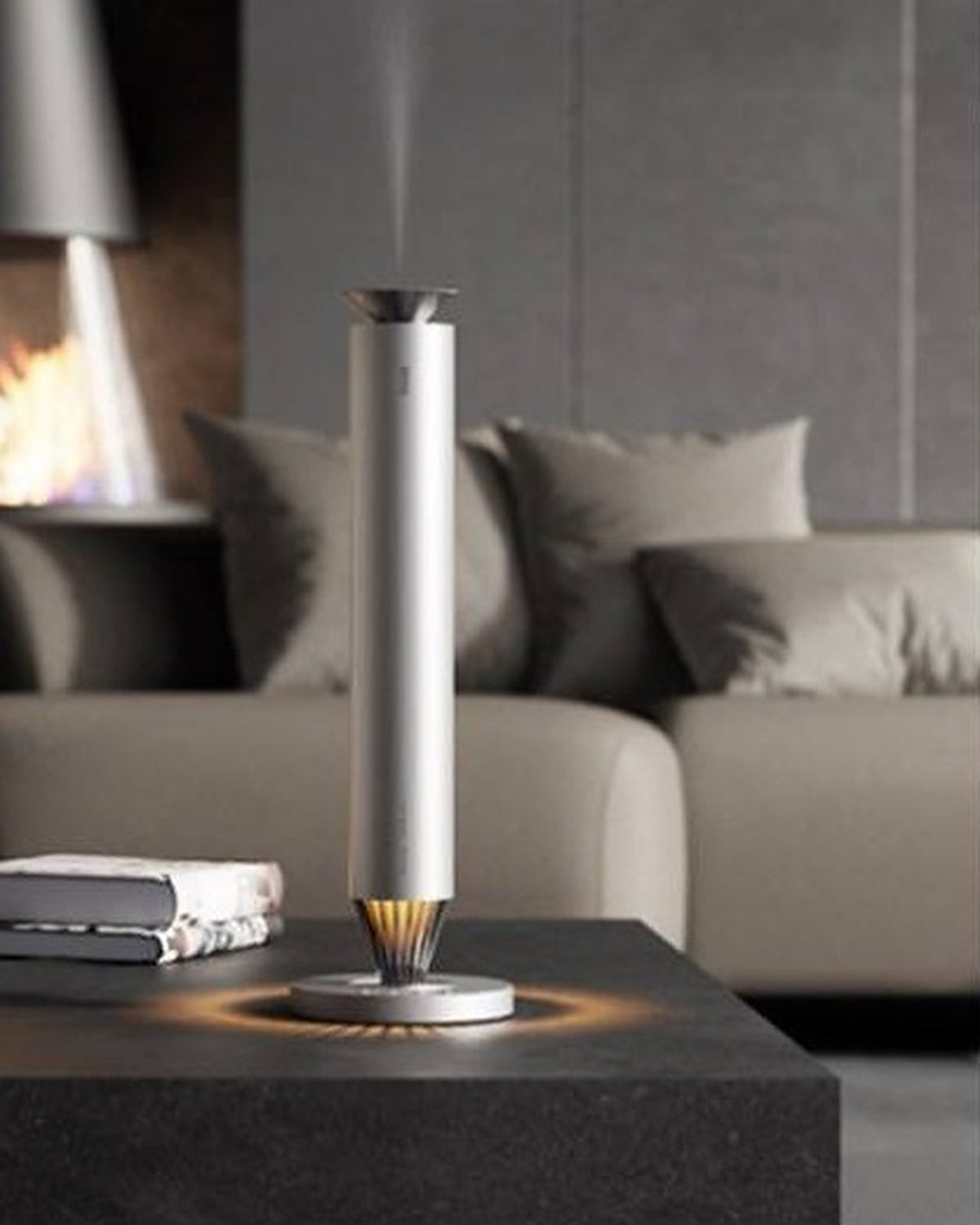 3004 V900S Desktop Aroma Diffuser – Frosted Silver – V900S on coffee table in living room with fireplace