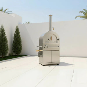 Beast dual fuel fire-brick pizza oven outdoors on modern patio with white walls, trees, blue sky
