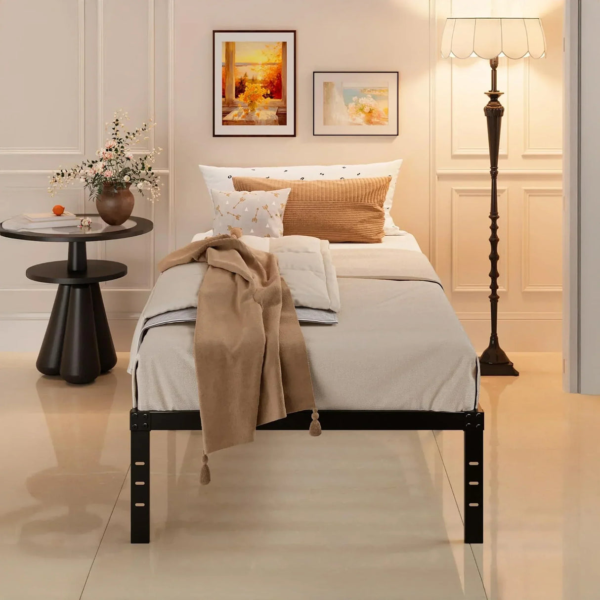 Modern UAE bedroom with minimalist bed, cozy throw, side table, floral decor, and elegant floor lamp