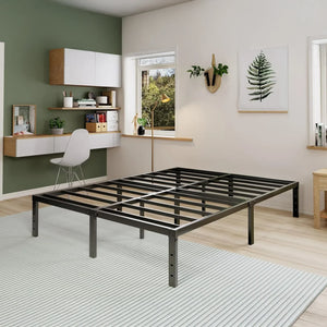 Modern black metal bed frame in bright home office bedroom with green accent wall, HOCC UAE