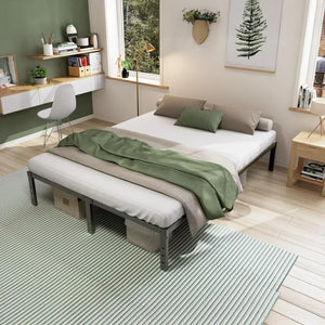 Modern bedroom with a green and white bed, minimalist decor, and natural light at HOCC UAE.