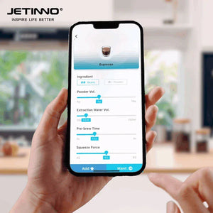Hand holding smartphone showing espresso brewing app with adjustable bean volume, water volume, pre-brew time, and squeeze force settings