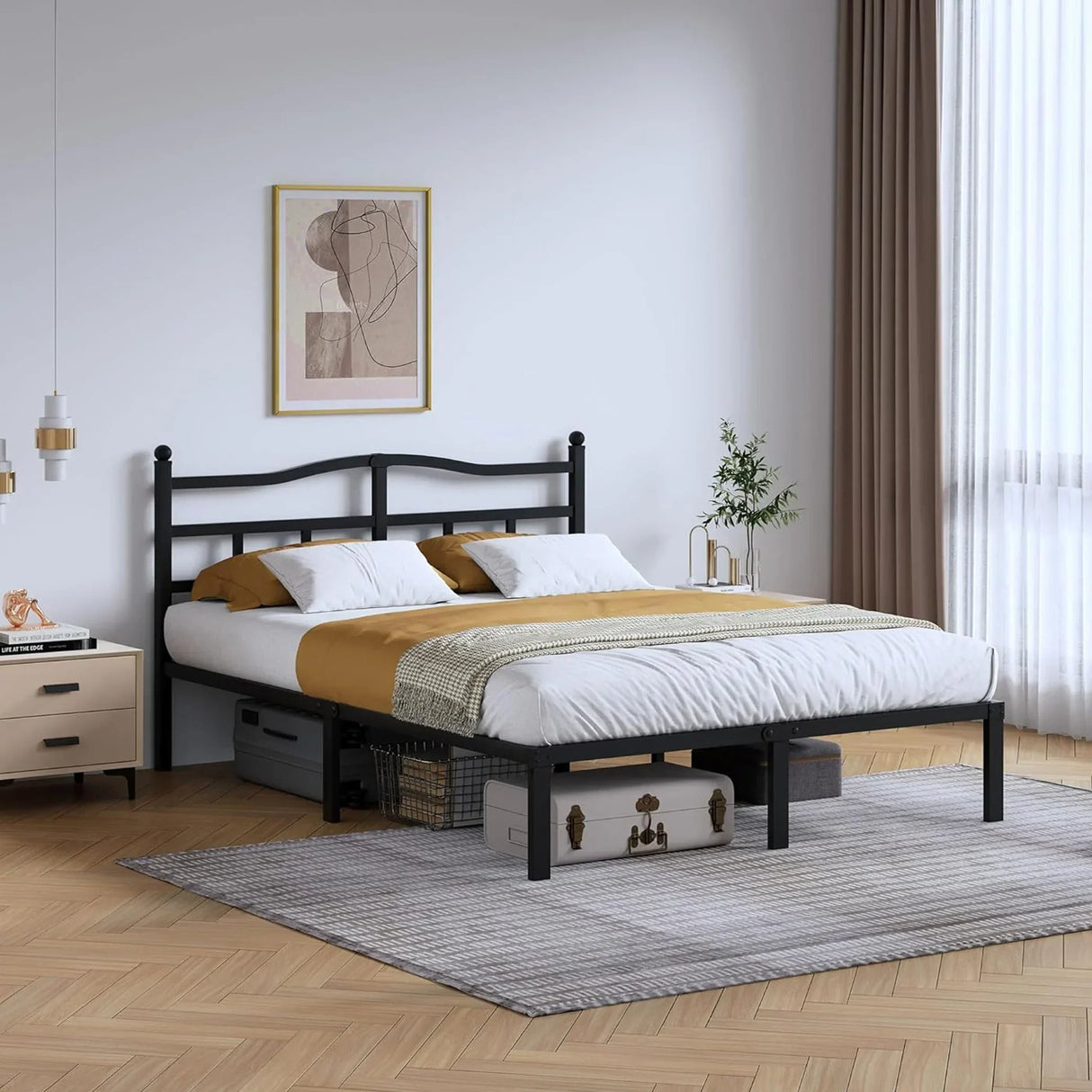 Modern bedroom with black metal bed frame, mustard bedding, and underbed storage on HOCC UAE.