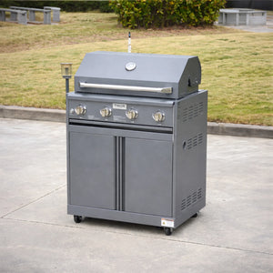 Stainless steel outdoor gas grill with four burners and storage cabinets on wheels in a garden
