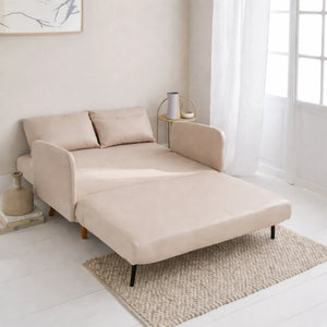 Beige convertible sofa bed in modern living room with soft natural light, home decor UAE