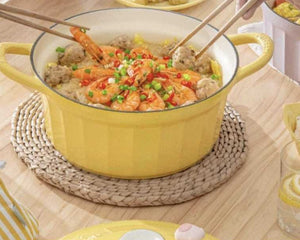 BUYDEEM CP551 Enamel Cast Iron Casserole 25cm – yellow 25 cm pot on a family dinner table