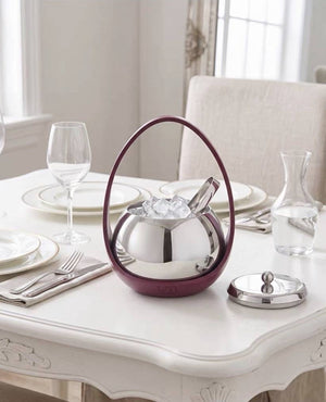 LUXMOOD Magic Egg Ice Bucket 1L – Silver – ice and tongs in the bowl, lid set aside, on a white table